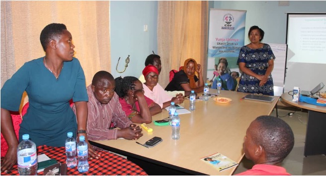 Bigile (first left, standing) during the CHWs training conducted in Tarime District